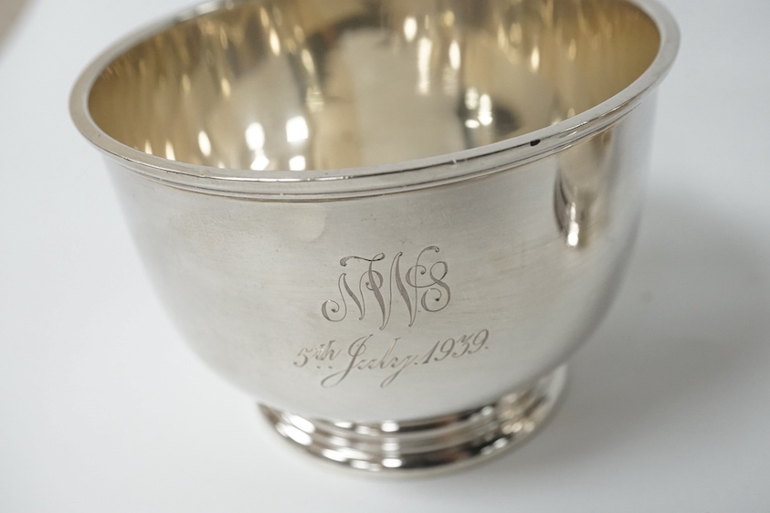 A George VI silver cream jug and sugar bowl by Blackmore & Fletcher Ltd, London, 1939, jug 10.9cm, 11.9oz, with engraved inscription. Condition - fair to good